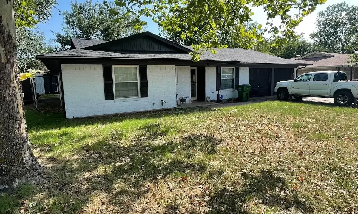 Professional roofing crew working on a residential roof in Eagle Mountain